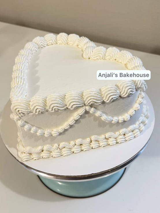 white vintage heart cake